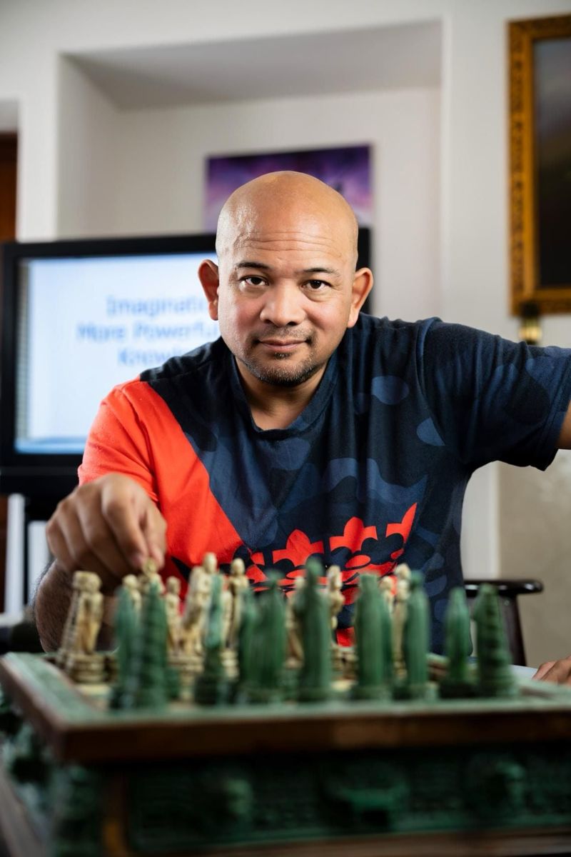 King Kātō at a chess board